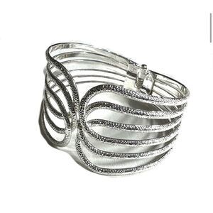 Silver tone textured hinged wide bracelet